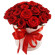 красные розы в шляпной коробке. Суринам